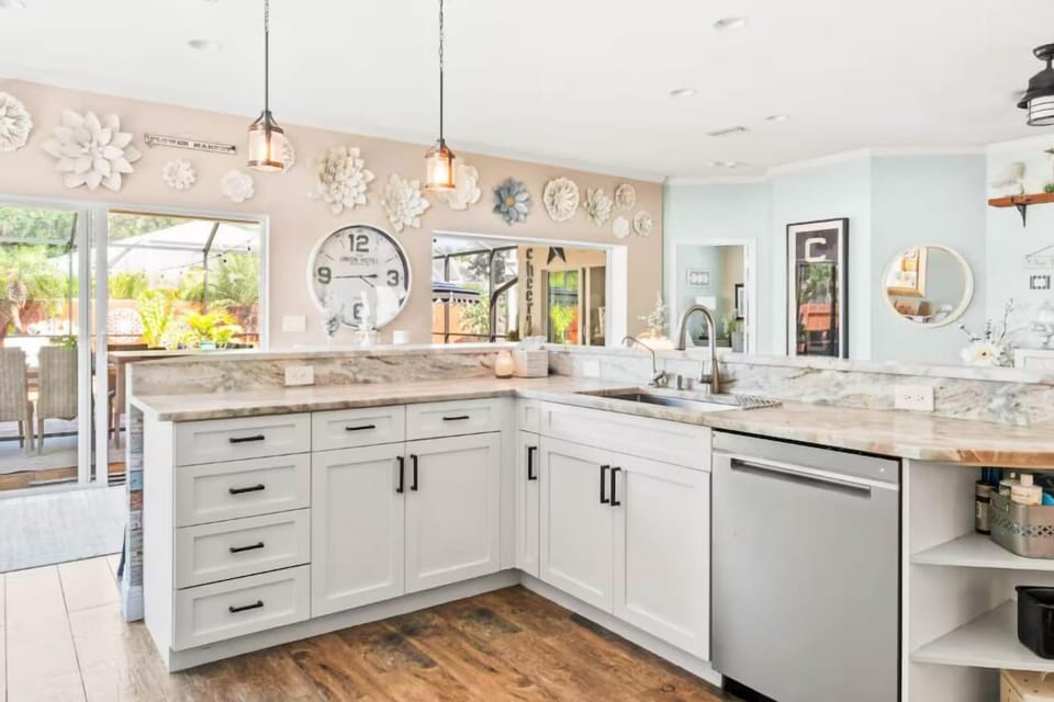 Spacious kitchen right by the living room and patio/pool area.