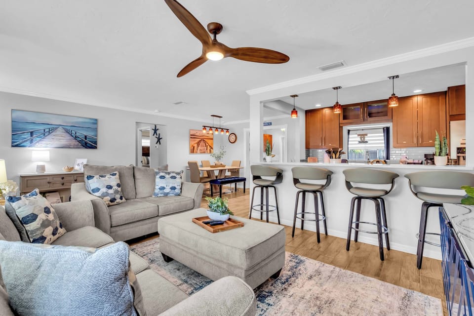 The open flow from the living room, dining room, and kitchen make it a great spot for entertaining