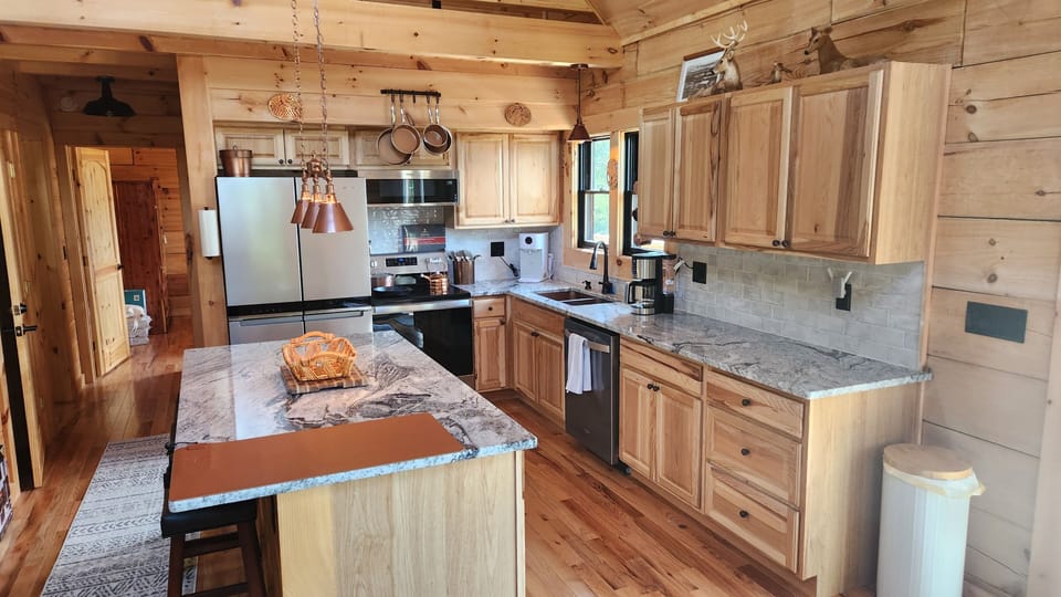 Gourmet kitchen with granite countertops and kitchen island
