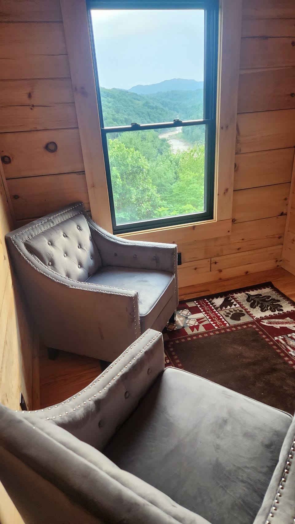 Loft seating area with view of North Toe River