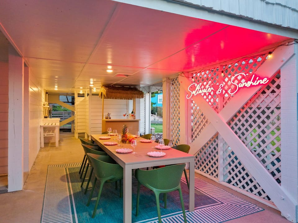 Outdoor Dining: Dine al fresco under neon lights, surrounded by fun vibes and tr