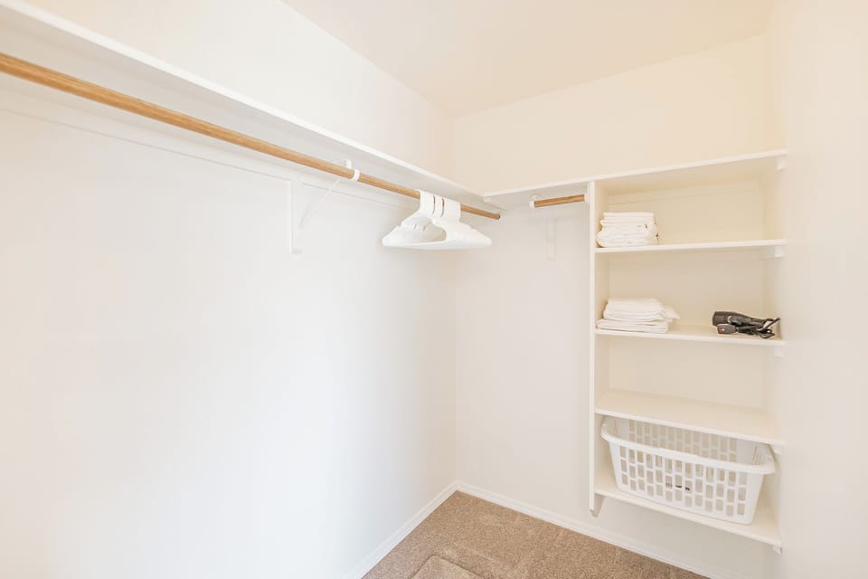 Primary Bedroom walk-in closet