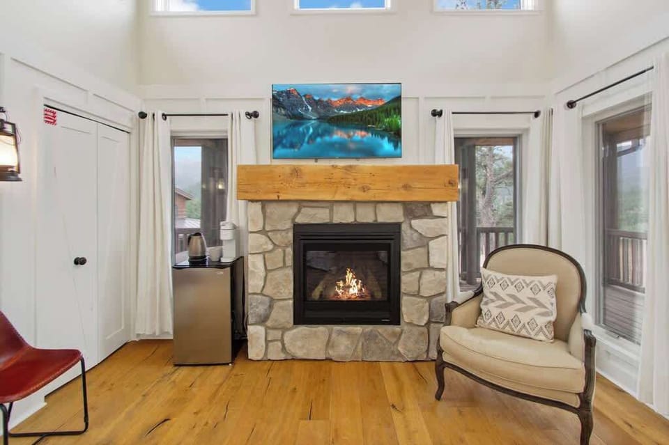 Sitting Area with Fireplace, TV, & Mini Fridge