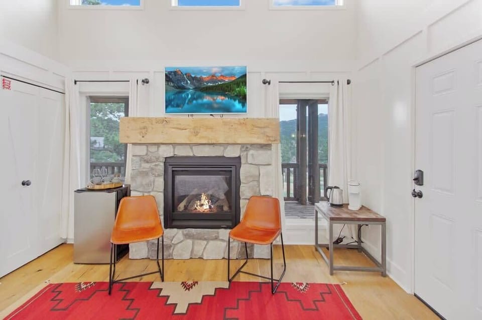 Sitting Area with Fireplace, TV, & Mini Fridge