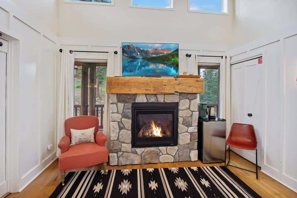Sitting Area with Fireplace, TV, & Mini Fridge