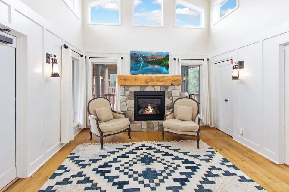 Sitting area with fireplace and TV