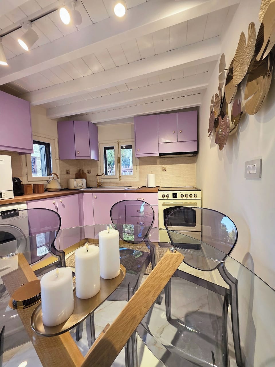 Dining table and kitchen and dishwasher