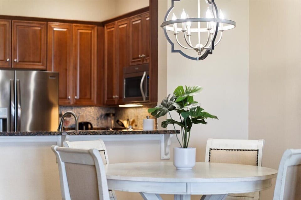 Family dining table with comfortable seating for four, perfect for shared meals and easy conversation.