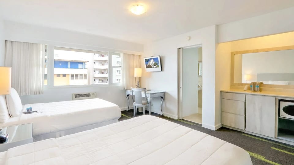 Recharge with quick snacks from the convenient in-room kitchenette.