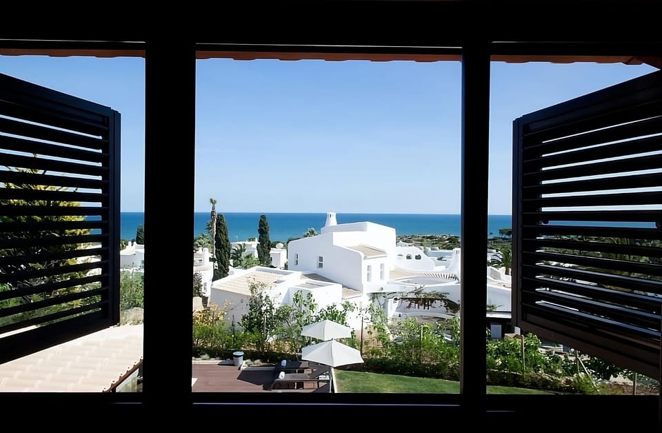 Gaze out at bright rooftops and sparkling coastline vistas