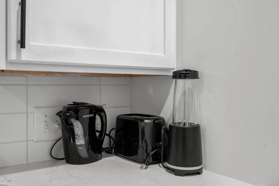 Embark on culinary adventures in our modern, well-equipped kitchen. Featuring a sleek gas stove and ample countertop space, it provides everything you need to whip up a delicious meal during your stay. ✨