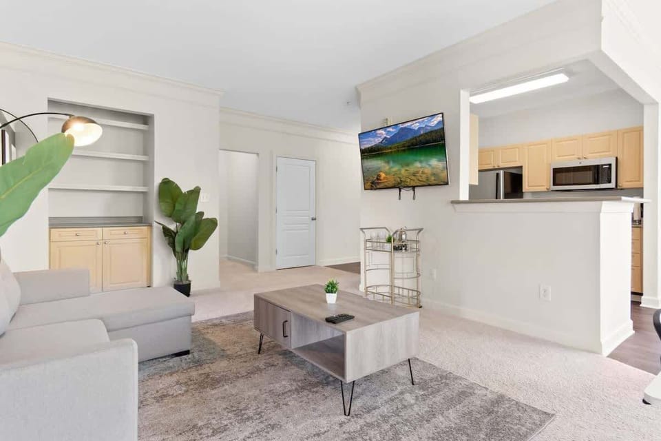 stylish lounge area with modern decor, ambient lighting, and plenty of space to gather.
