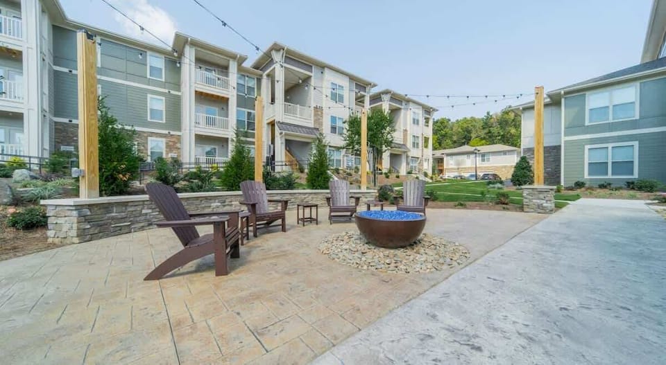 Unwind in our charming patio oasis, complete with cozy seating and ambient firepit. Embrace the outdoors and create unforgettable moments in this tranquil haven.