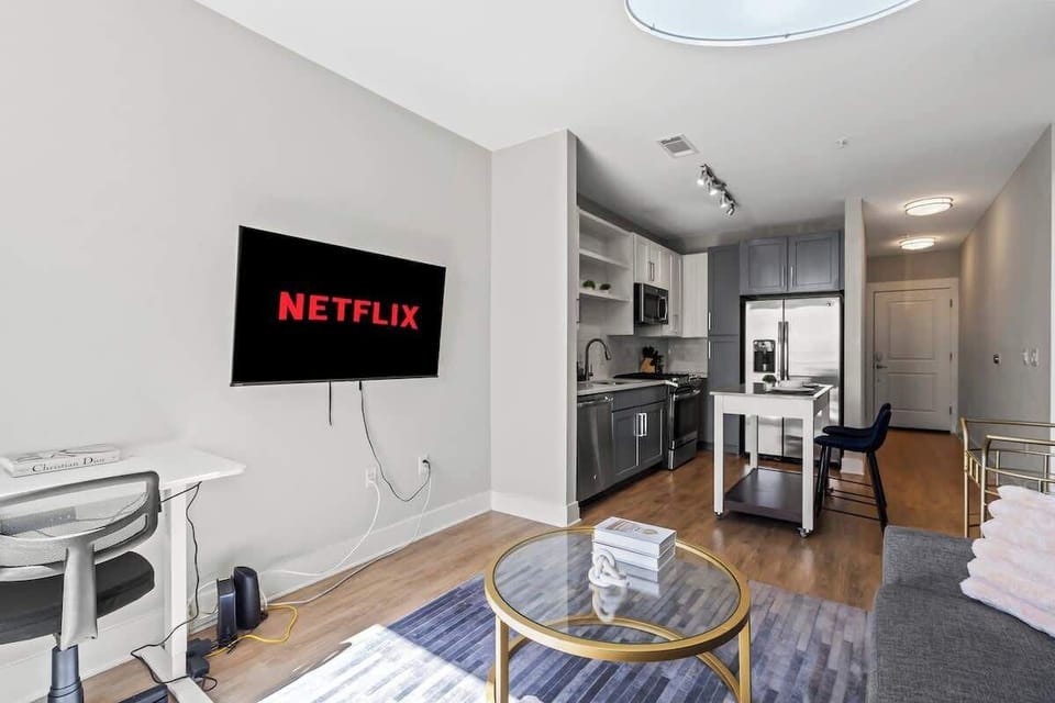 This living room invites you to relax with loved ones, whether you're sharing stories or watching your favorite movie in total comfort.