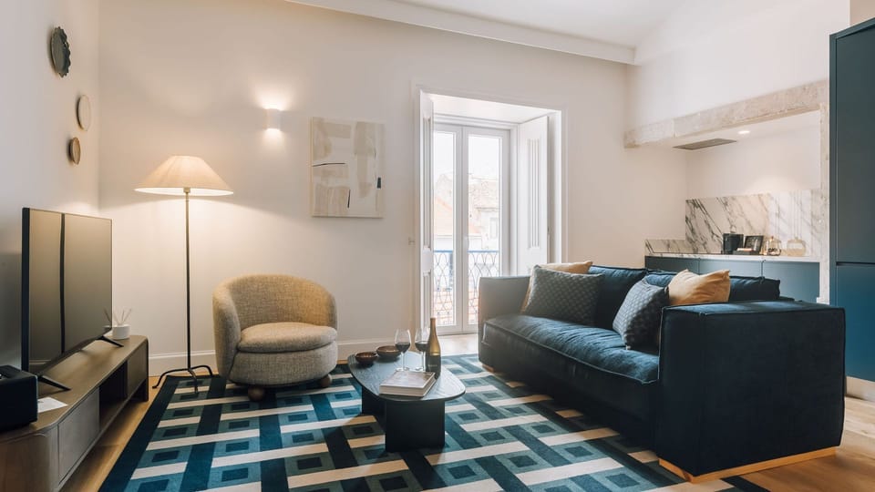 A peaceful living area with soft tones — perfect for relaxing after a day exploring Lisbon.
 #AndoLiving #Portugal #Santos #LisbonVibes #CozyMoments