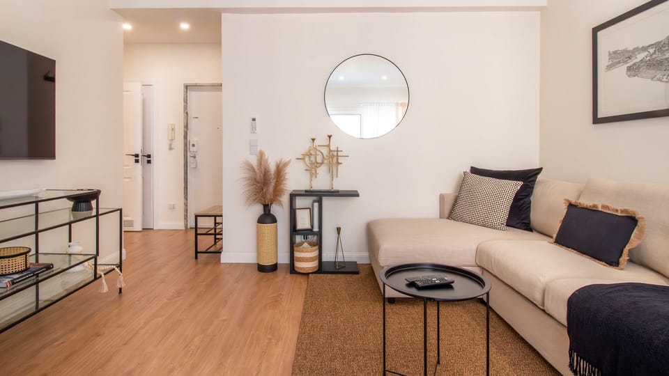 A stylish and spacious living room ready for relaxation. #ChicLiving #ComfortableSpace