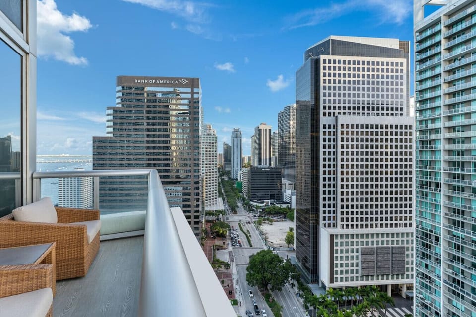 Private balcony with stunning city views, perfect for morning coffee or evening unwinding.