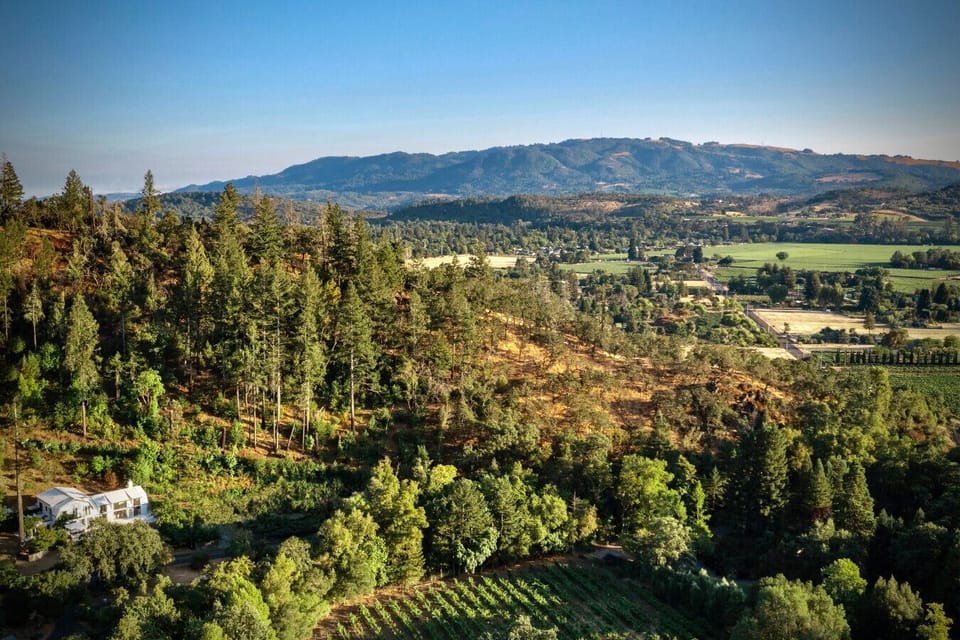 Aerial View of Property and Surrounding Land