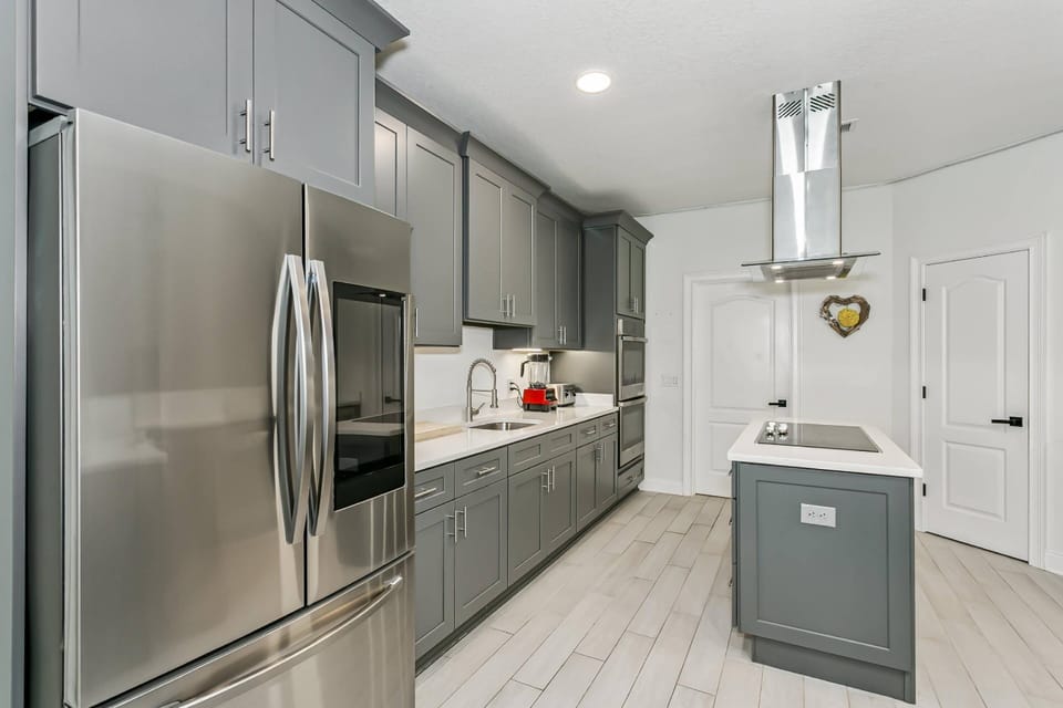 Gorgeous kitchen with high end appliances and quartz counters