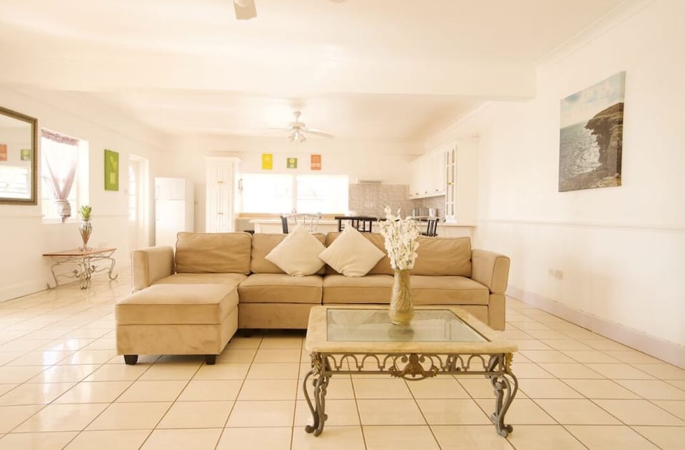 Spacious living room space with smart TV