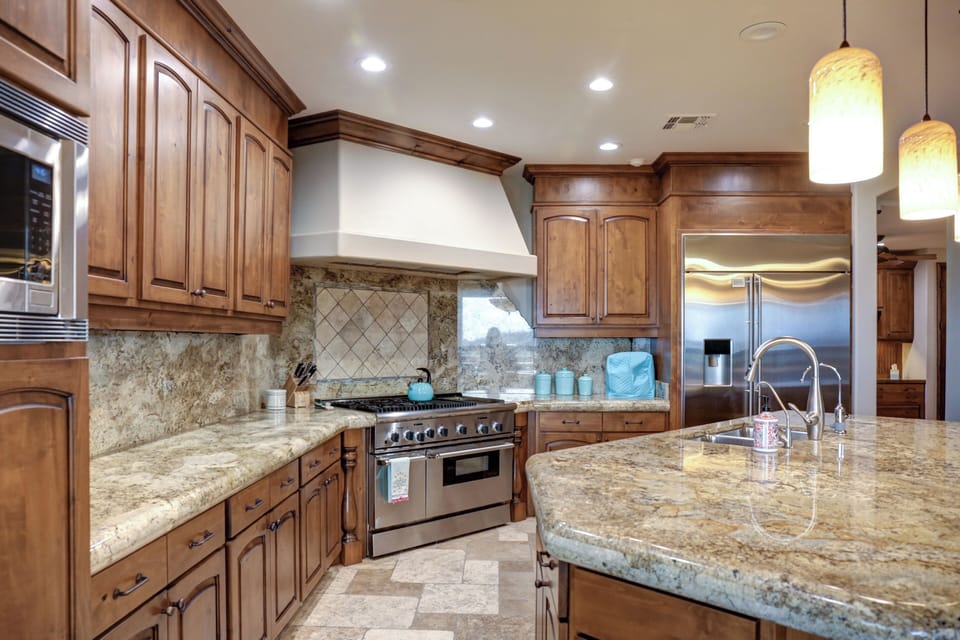 Fully stocked kitchen has room for lots of helpers for family dinners.