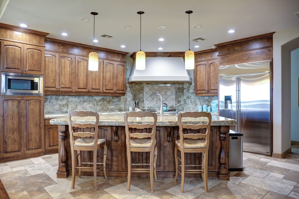 Large island is perfect to gather around during meal prep and clean-up.