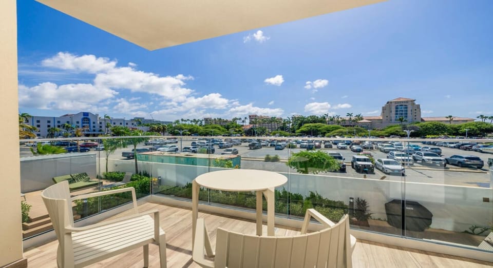 Our balcony, complete with a table and chairs, is the perfect spot for morning coffee, evening drinks, or simply soaking up the views. Enjoy the fresh air and create memorable moments outdoors.