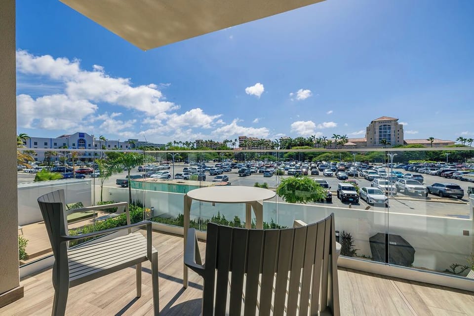 Our balcony, complete with a table and chairs, is the perfect spot for morning coffee, evening drinks, or simply soaking up the views. Enjoy the fresh air and create memorable moments outdoors.