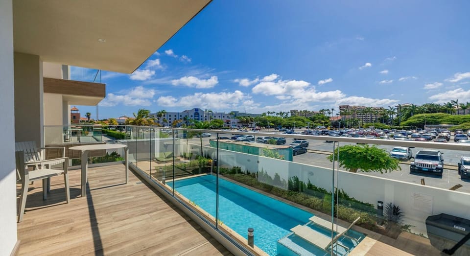 Our balcony, complete with a table and chairs, is the perfect spot for morning coffee, evening drinks, or simply soaking up the views. Enjoy the fresh air and create memorable moments outdoors.