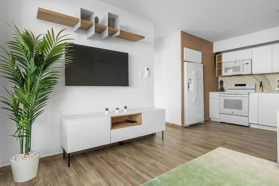 Unwind on the comfy sofa bed and catch your favorite shows on the TV — the perfect blend of relaxation and convenience in our cozy living space.