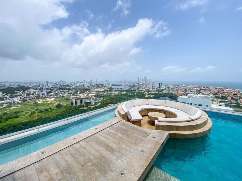 Rooftop Pool with Round Couch Breathtaking City View!