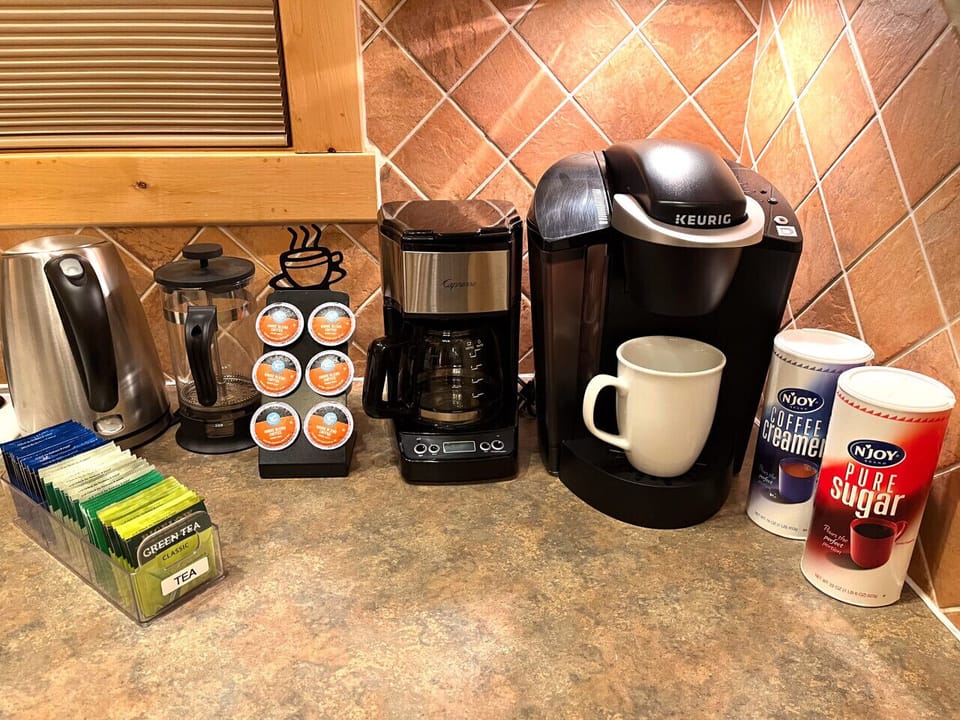 We provide coffee, powdered creamer, and sugar.