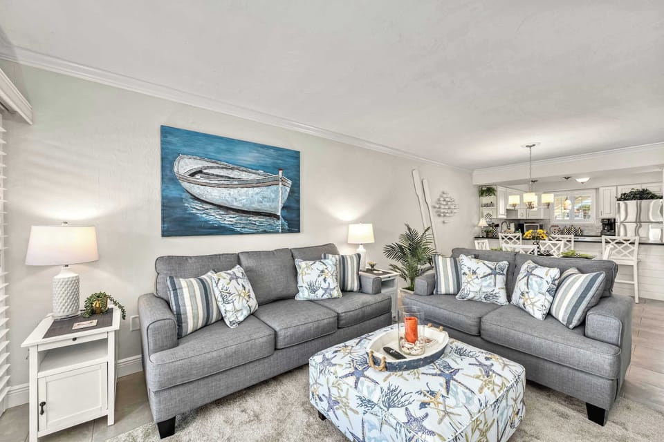 Comfy full sized couch and loveseat providing flexible lounging arrangements for all!