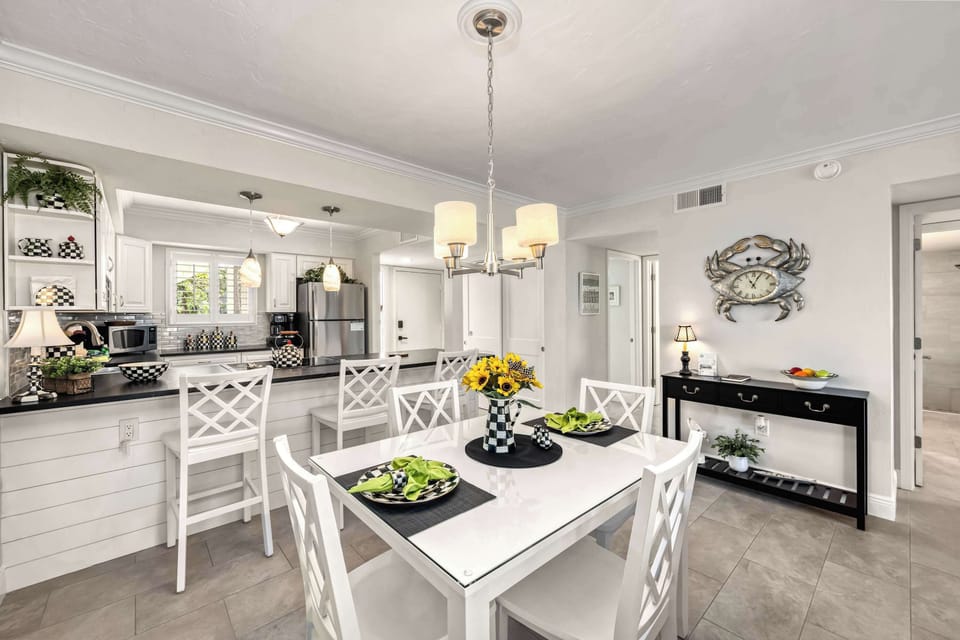Open concept provides variations in seating arrangements for formal dinners to family game nights.