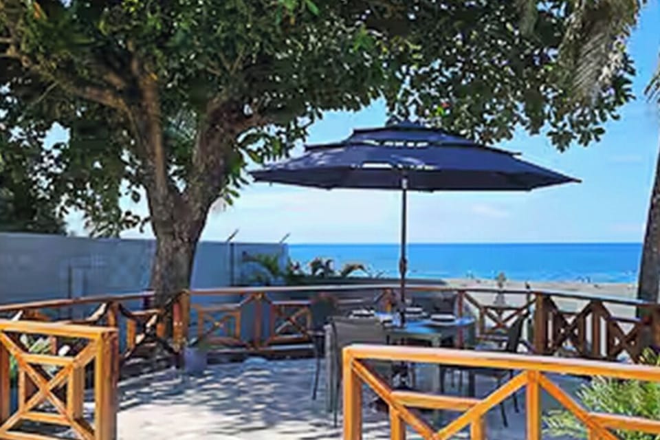 Wake up to this stunning view - where the Caribbean Sea kisses the shore!