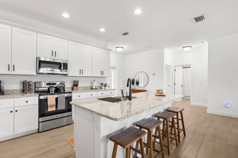 Fully Stocked Kitchen with large island for your comfort
