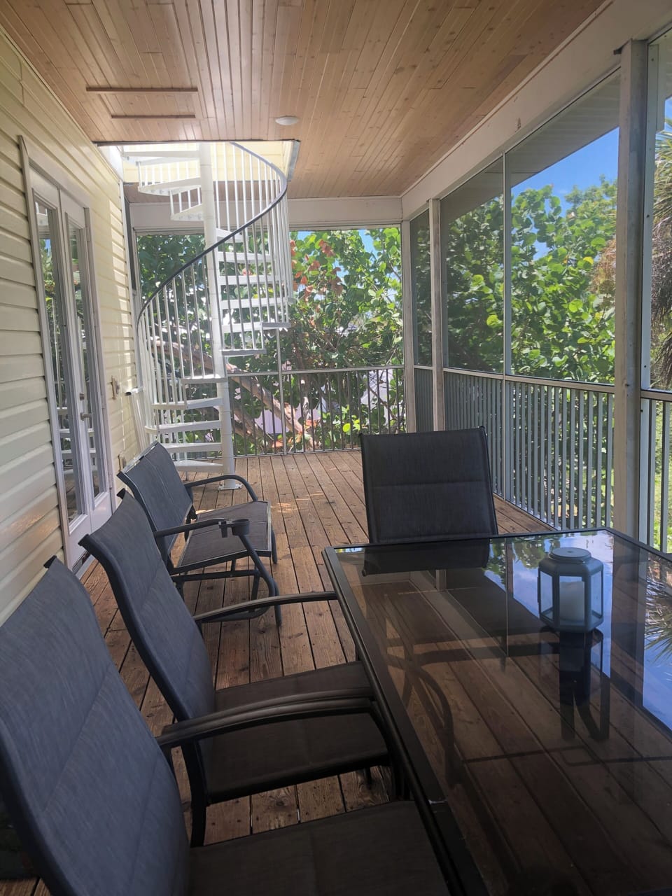 Outdoor eating area overlooking tropical landscape