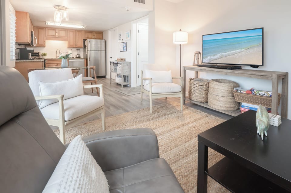 The open living/dining/kitchen space offers plenty of room to hang out.