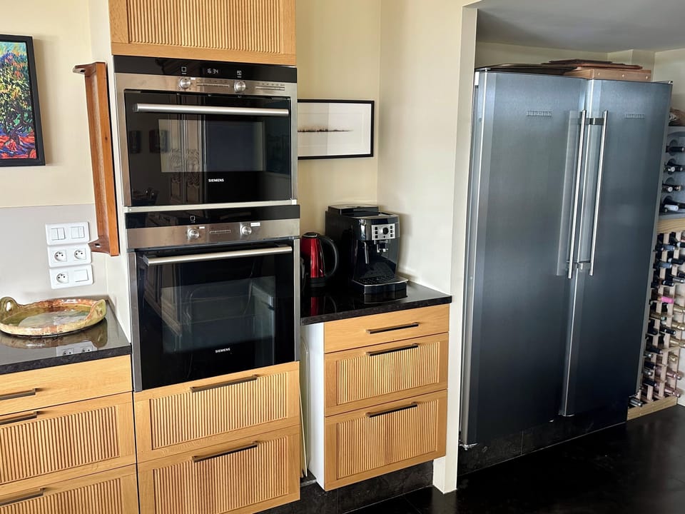 Main House Upper Level - Microwave, oven, espresso machine, double refrigerator.