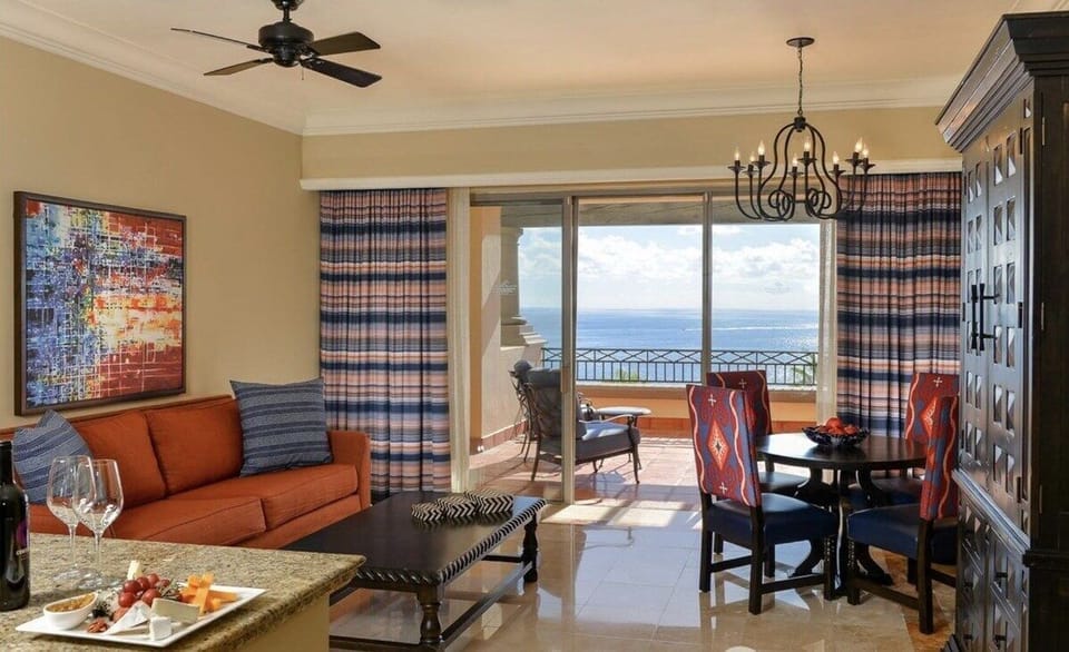 Living/dining room with pull-out sofa bed.