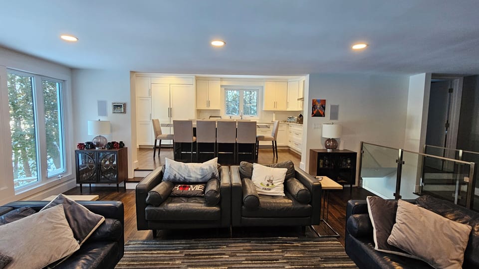 Upstairs living room, looking into kitchen