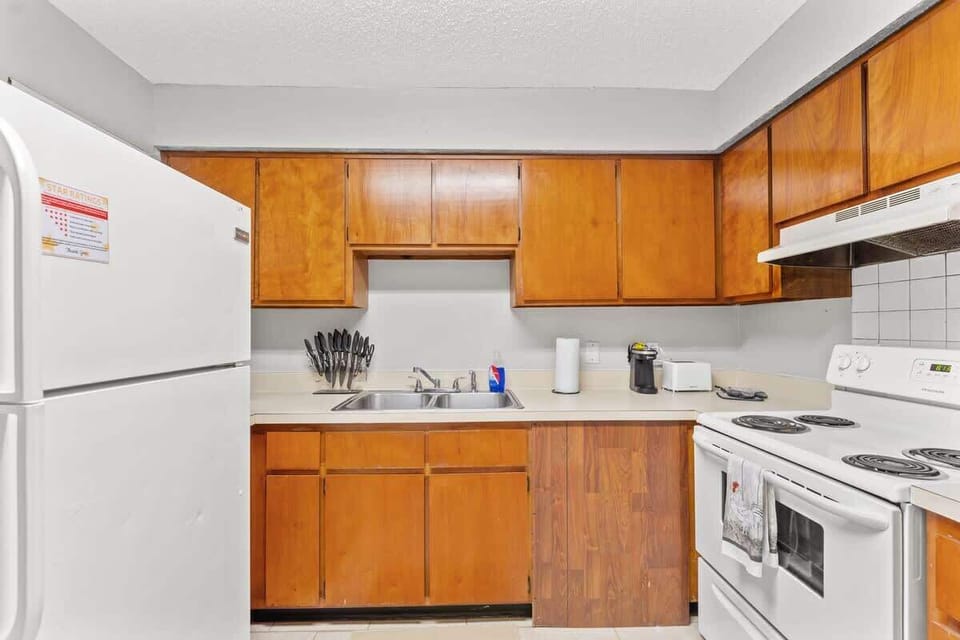 Kitchen offers full size refrigerator, stove/oven, microwave, toaster, toaster oven, Keurig coffee maker, pots & pans, and more.