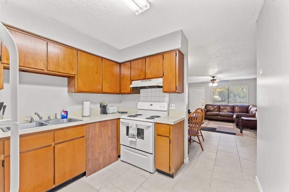 Kitchen offers full size refrigerator, stove/oven, microwave, toaster, toaster oven, Keurig coffee maker, pots & pans, and more.