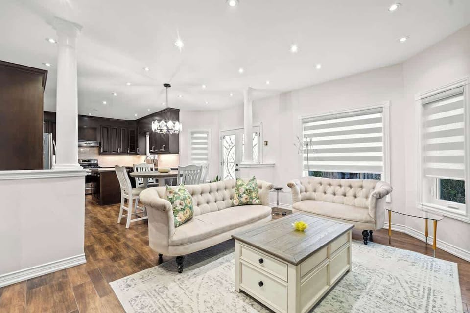 Sophisticated open living, modern kitchen, and dining area for memorable stays.