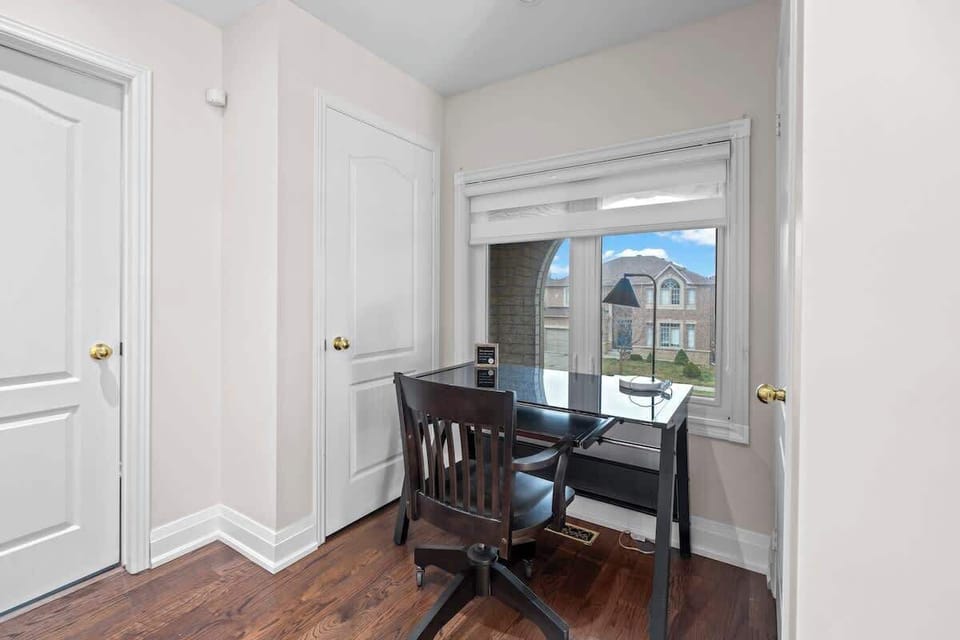 Stay productive in your bright dedicated workspace with a view.