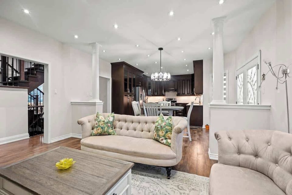 Inviting open-concept living connects to a sleek, modern eat-in kitchen. Gather here!
