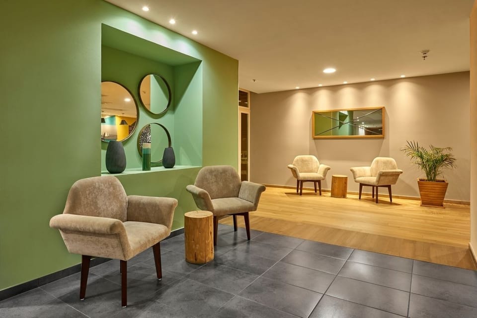 Settle into quiet corners designed for calm conversation.