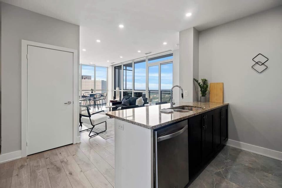 Enjoy a sleek, fully-equipped kitchen & bright living with city views!