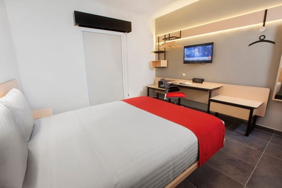 Stretch out and enjoy a sleek, modern room layout.