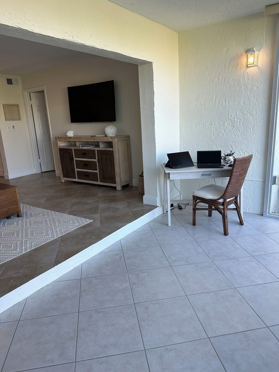Lanai with desk, chair, and lamp